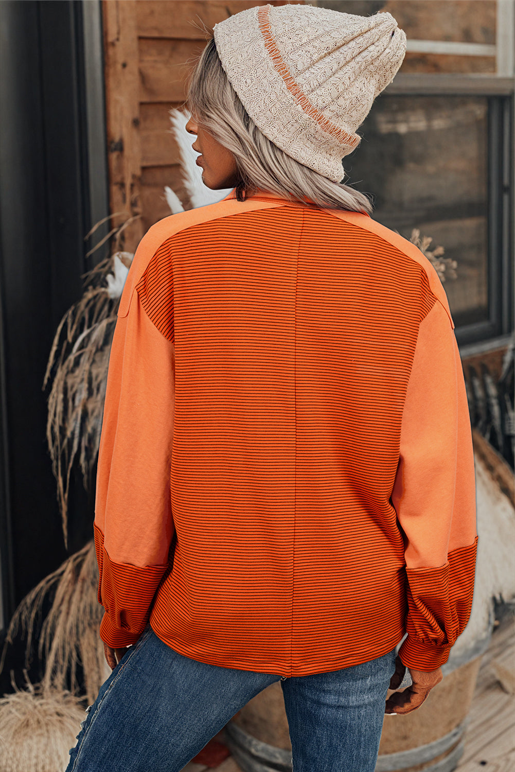 Trendy Henley Pullover with Puff Sleeves and Exposed Seams