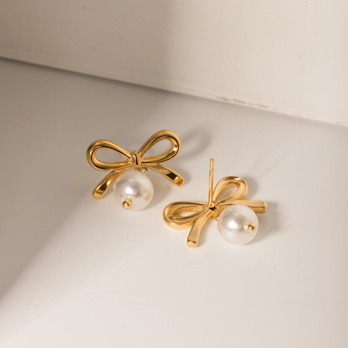 Stainless Steel Gold Bow Pearl Earrings
